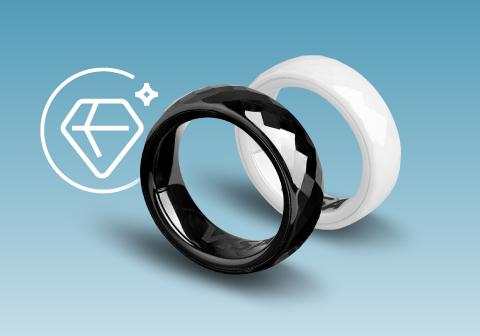 Du žiedai: vienas baltas, kitas juodas su blizgiu paviršiumi. 'Visa' logotipas matomas balto žiedo viduje.