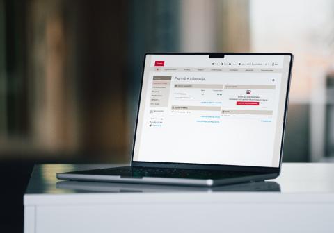 A laptop with Citadele online banking open, showing payment or account information on the screen.